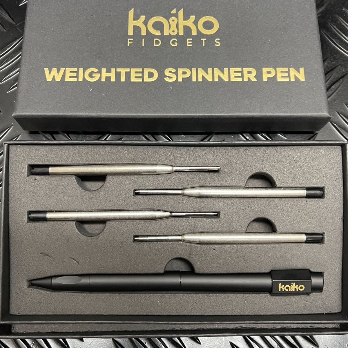 BLACK Weighted Spinner Pen with 4 refills